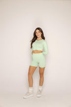 Buzo versatile verde meta